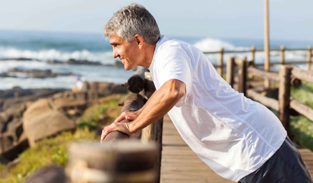 senior man exercises to stay healthy over age 60